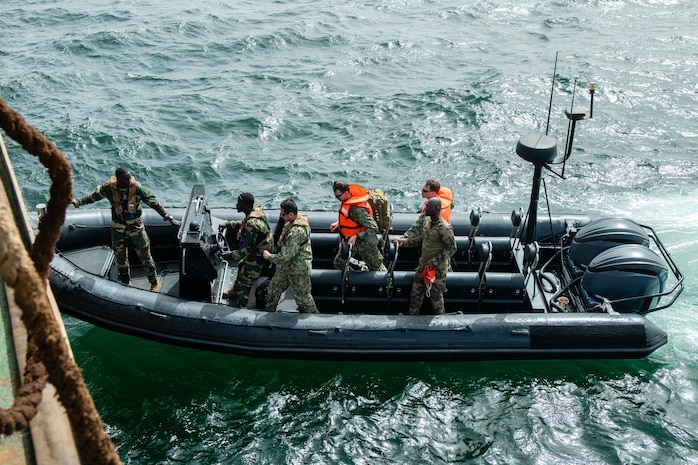 Students and instructors approach a merchant training vessel during a Senegalese led Visit, Board, Search, and Seizure (VBSS) training exercise during Obangame Express. Obangame Express is one of three regional maritime exercises led by U.S. Sixth Fleet as part of a comprehensive strategy to provide collaborative opportunities to African forces and international partners to address maritime security concerns.
