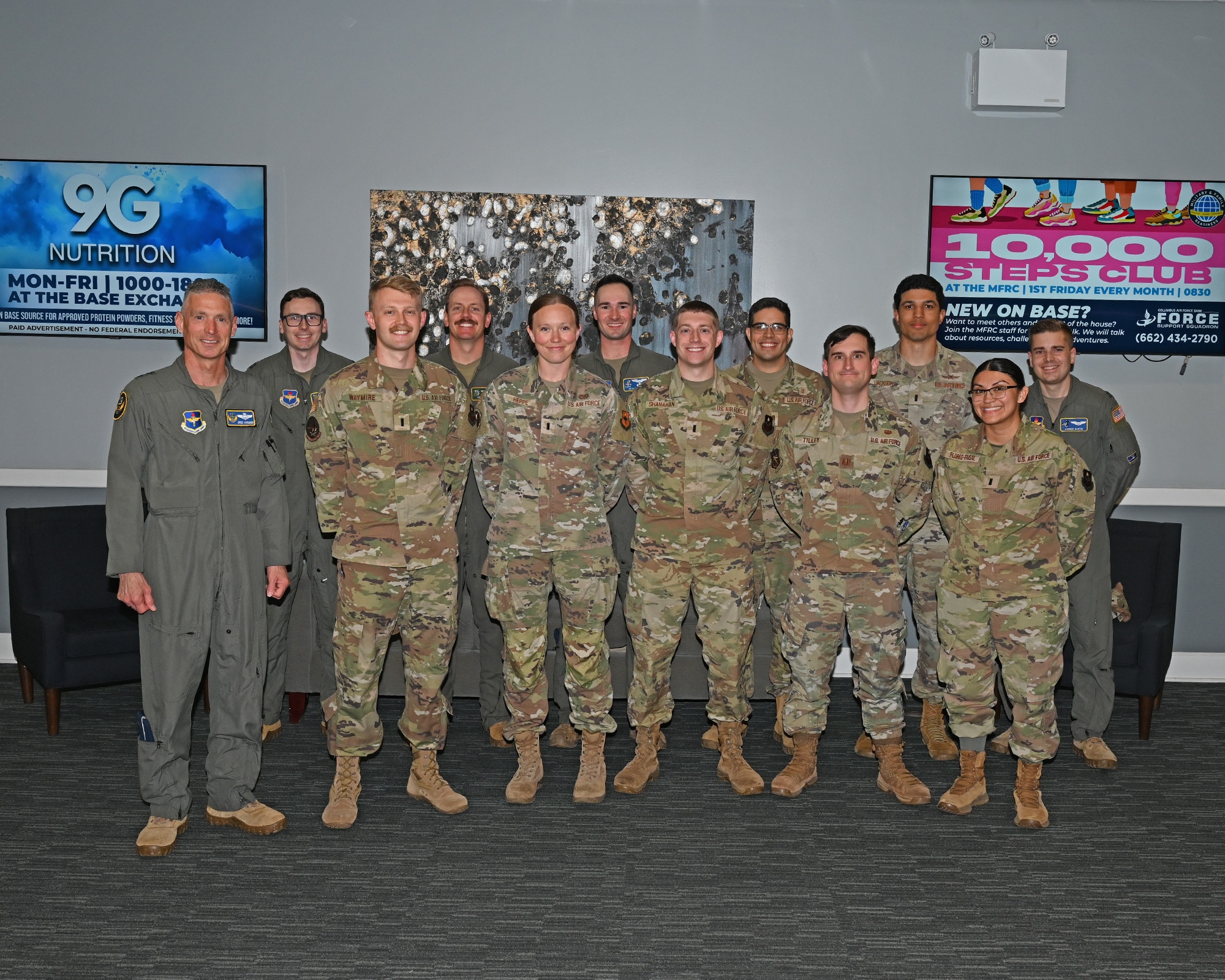 Maj Gen Kreuder and Chief Scott pose for a group picture with CGOs from CAFB.