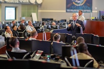 Mr. Durkin, Director of Navy Warfare Development Center, briefs Vice Admiral Thibault de Possesse—Director of the Center for Advanced Military Studies and President of the French Defense University—along with a 42-member delegation from the French Defense University, on the importance of U.S. Navy–French Navy cooperation during their visit aboard the Navy Warfare Development Center.