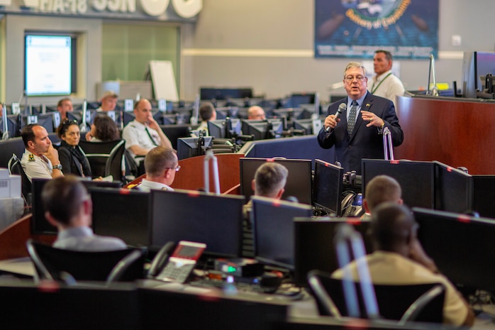 Mr. Durkin, Director of Navy Warfare Development Center, briefs Vice Admiral Thibault de Possesse—Director of the Center for Advanced Military Studies and President of the French Defense University—along with a 42-member delegation from the French Defense University, on the importance of U.S. Navy–French Navy cooperation during their visit aboard the Navy Warfare Development Center.