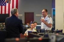 Mr. Durkin, Director of Navy Warfare Development Center, briefs Vice Admiral Thibault de Possesse—Director of the Center for Advanced Military Studies and President of the French Defense University—along with a 42-member delegation from the French Defense University, on the importance of U.S. Navy–French Navy cooperation during their visit aboard the Navy Warfare Development Center.