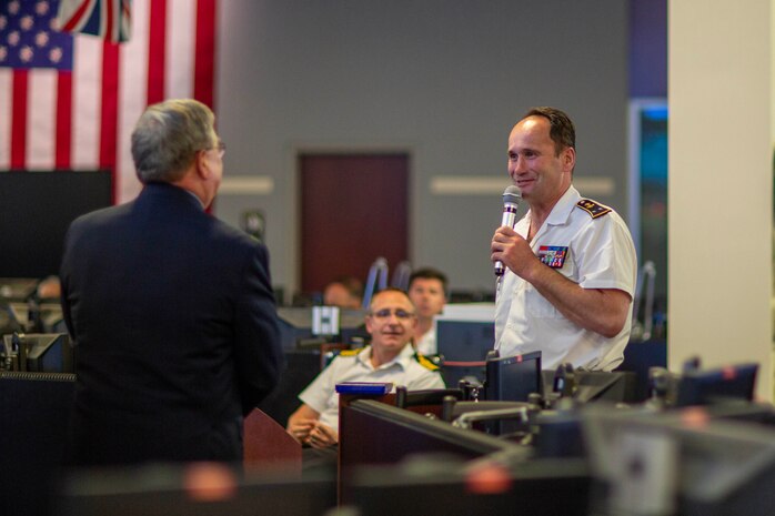 Mr. Durkin, Director of Navy Warfare Development Center, briefs Vice Admiral Thibault de Possesse—Director of the Center for Advanced Military Studies and President of the French Defense University—along with a 42-member delegation from the French Defense University, on the importance of U.S. Navy–French Navy cooperation during their visit aboard the Navy Warfare Development Center.