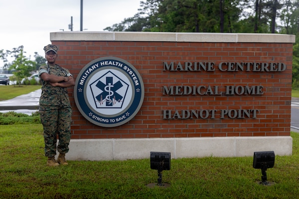 U.S. Navy Hospital Corpsman 3rd Class Niyona Gibbs, a dental technician with 2nd Dental Battalion, 2nd Marine Logistics Group, and a native of Bayboro, North Carolina, poses for a photo at Marine Corps Base Camp Lejeune, North Carolina, May 12, 2025. Gibbs was selected as the 2nd MLG Warrior of the Week by her leadership for her proficiency, maturity, and dedication to her job as a dental technician.  Her impact during exercise Joint Viking was remarkable where she assisted in the care of 200 patients and provided 75 hours of medical coverage during six training evolutions for the exercise. Each week, 2nd MLG recognizes one outstanding Marine or Sailor that goes above and beyond in their duties and embodies the qualities of an outstanding service member. (U.S. Marine Corps photo by Sgt. Alfonso Livrieri)