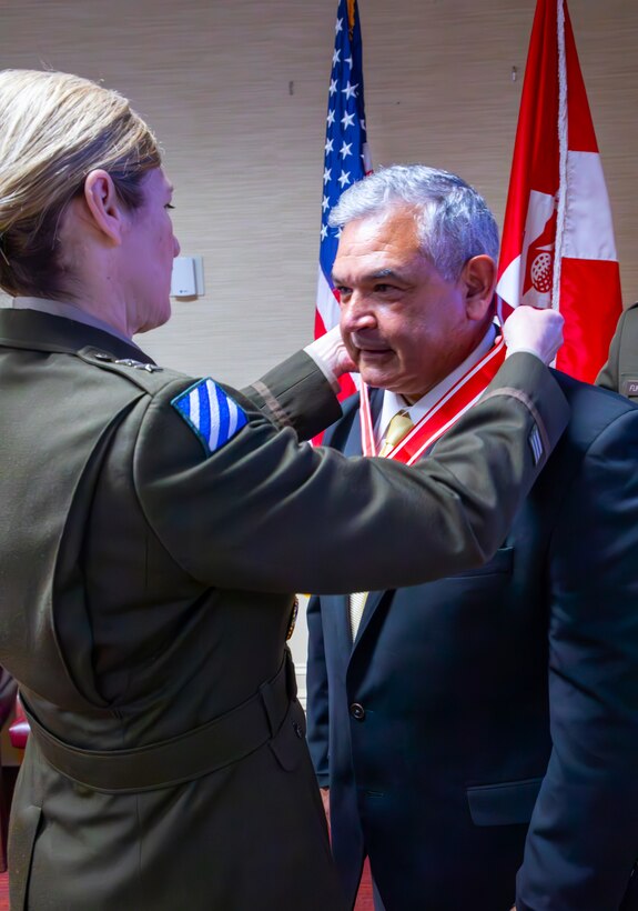 Man receiving an award