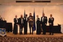 Braddon Kolafa, 2nd Civil Engineer Squadron structures foreman, accepts a distinguished honor graduate award during his noncommissioned officer academy graduation at Sheppard Air Force Base, Texas, April 2025. (U.S. Air Force courtesy photo)