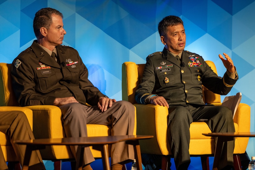 (Right) Philippine Army Maj. Gen. Ramon Zagala, commanding general of the Philippine Army Reserve Command, and U.S. Army Maj. Gen. Gavin Gardner, commanding general of 8th Theater Sustainment Command, sit on a panel to discuss the importance of essential warfighting capabilities for campaigning, crisis, and conflict during the Land Forces Pacific (LANPAC) Symposium and Exhibition, May 15, 2025, in Honolulu, Hawaii. The panel explored how reserve forces enhance power projection and crisis response in the Indo-Pacific through integration, readiness, and strategic positioning. (U.S. Army Photo by Spc. Abreanna Goodrich)