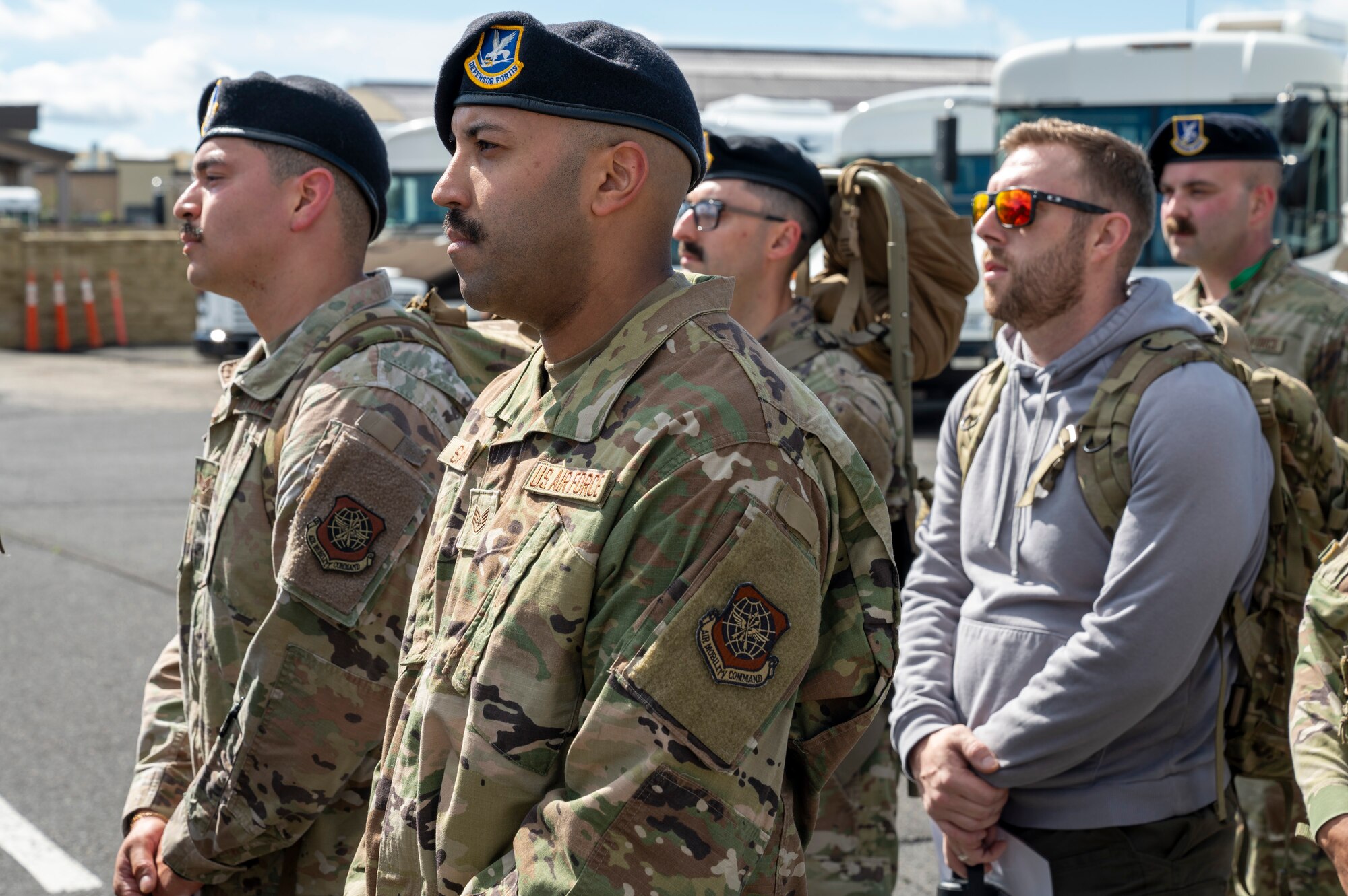 U.S. Air Force Staff Sgt. Aaron Sanchez, an installation patrolman assigned to the 92nd Security Forces Squadron, stands in formation during a Police Week Memorial Ruck at Fairchild Air Force Base, Washington, May 12, 2025. This four-mile memorial ruck honored all the fallen defenders, law enforcement officers, and Office of Special Investigations officers. (U.S. Air Force photo by Airman 1st Class Samantha Thorn).