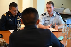 U.S. Air Force Lt. Col. Michael Kelly speaks with Royal Thai Air Force Airmen in an air domain awareness working group at an Airman-to-Airman Talks in Pattaya, Thailand, May 13, 2025.