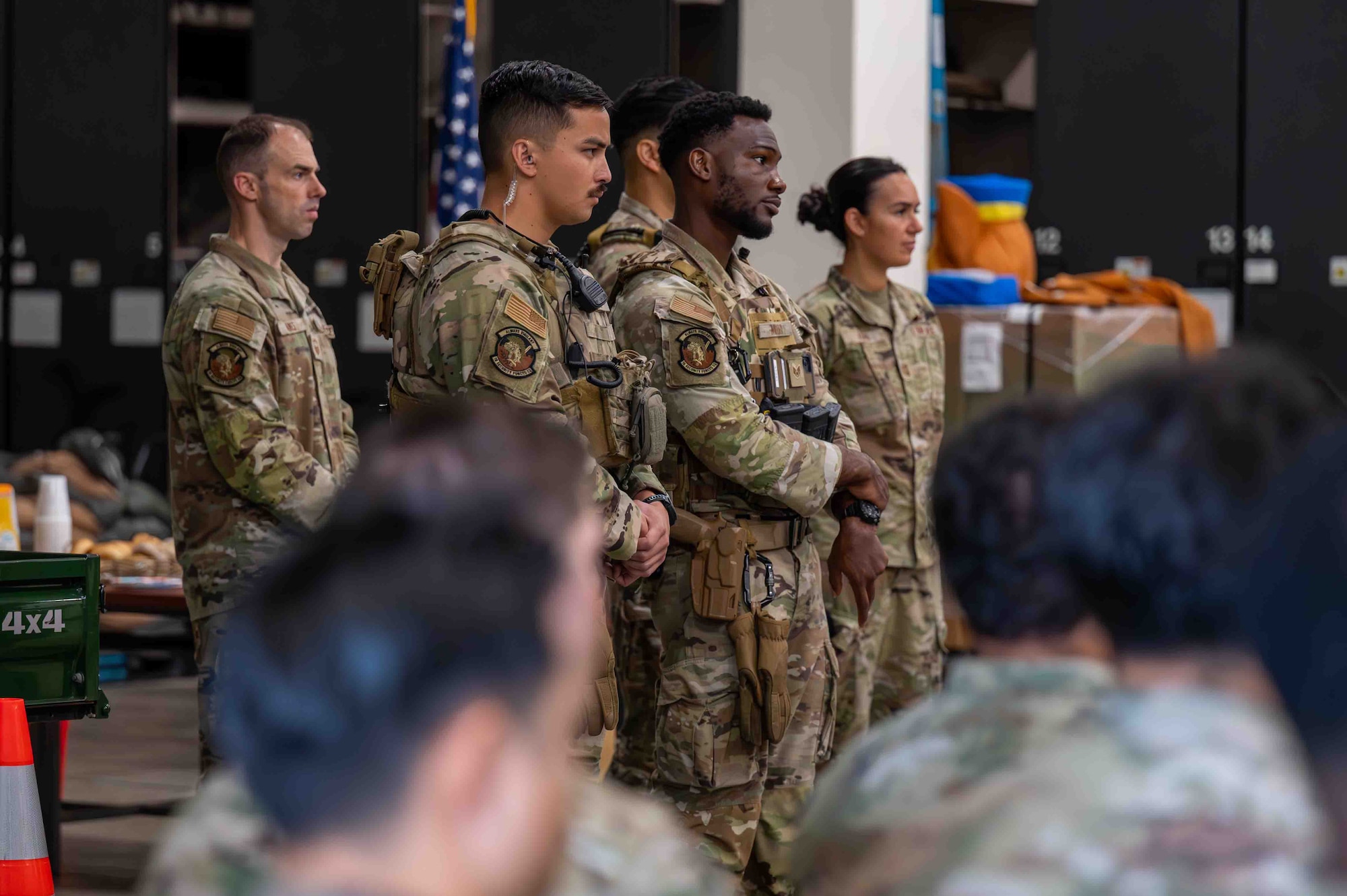 Service members attend the opening ceremony.
