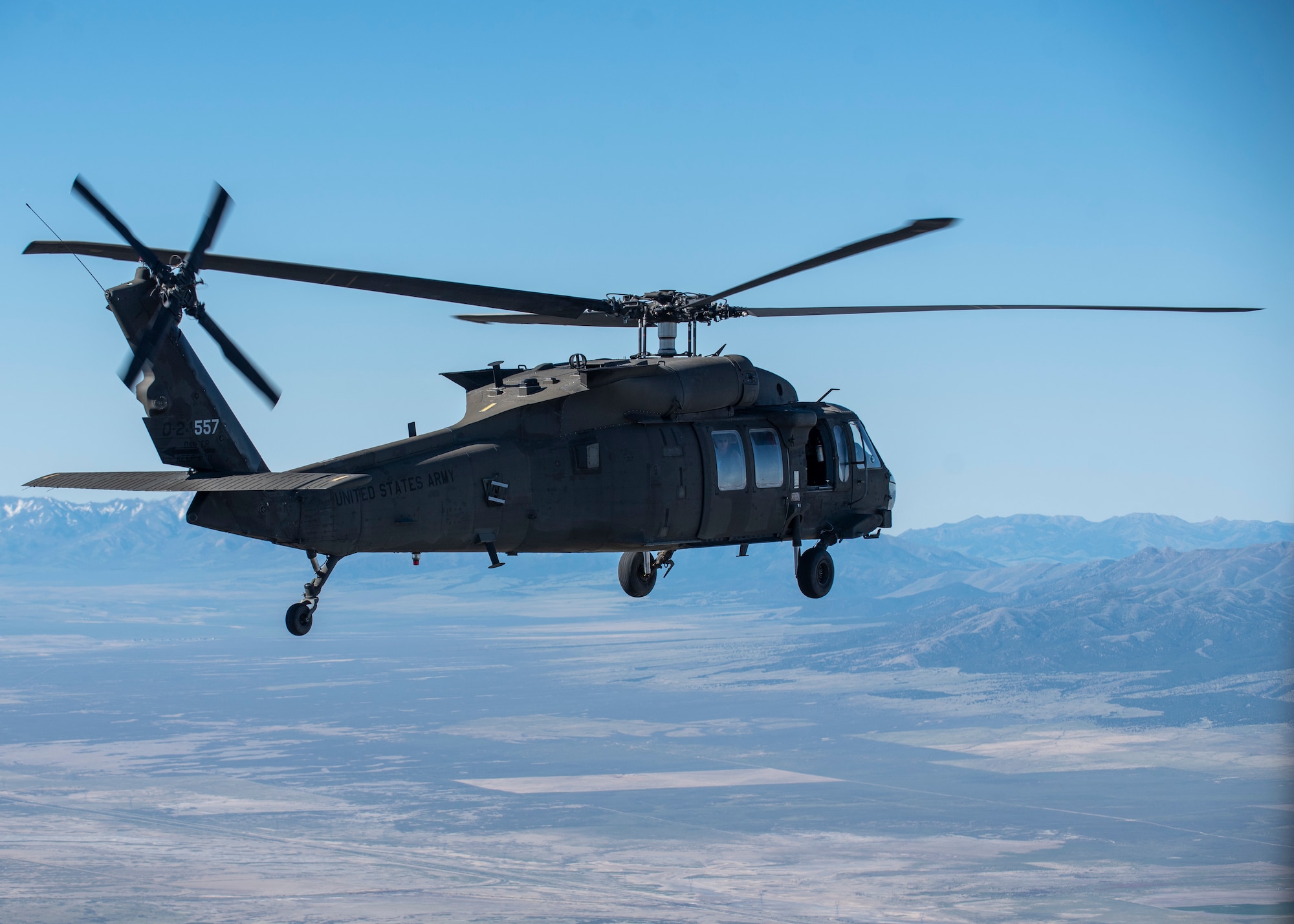 U.S. Army Service members of the 211th Aviation Regiment, Utah National Guard, provide ariel support for extraction of forces during Exercise Hydra , May 8, 2025, at the Utah Test and Trainging Range, Utah. Exercise Hydra challenges the joint force to adapt quickly and respond with lethal precision in multi-domain combat scenarios (U.S. Air National Guard photo by Senior Airman Kyle Blackham).