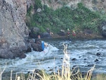 The Idaho Army National Guard’s State Aviation Group, working with the Boise Fire Department, assisted in the rescue of two rafters on the Owyhee River in Malheur County, Oregon, May 15.