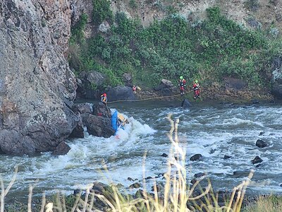 The Idaho Army National Guard’s State Aviation Group, working with the Boise Fire Department, assisted in the rescue of two rafters on the Owyhee River in Malheur County, Oregon, May 15.
