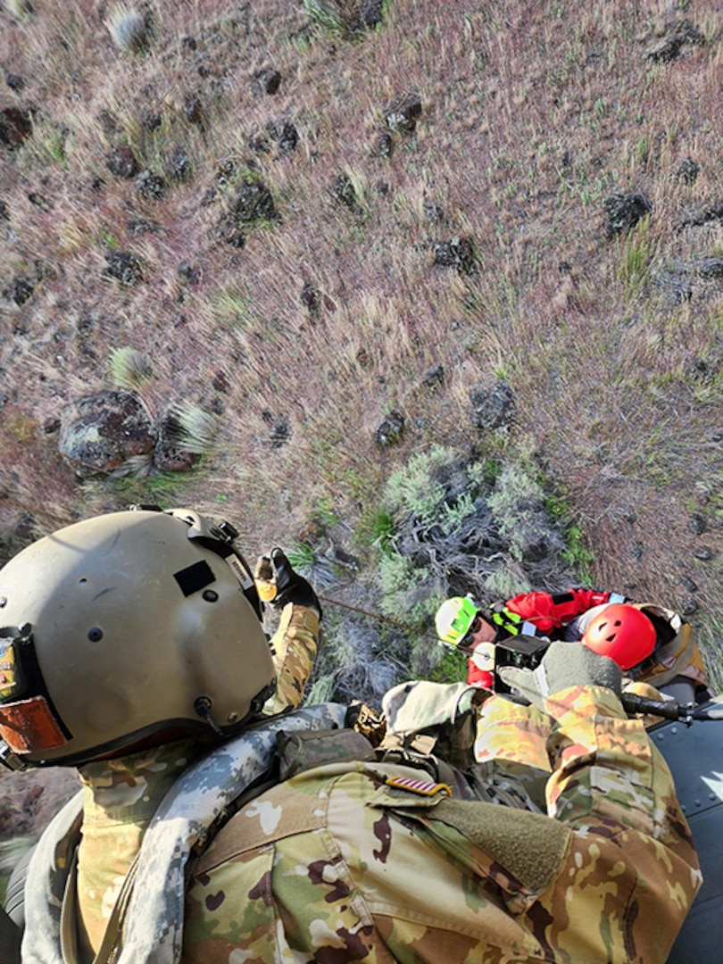 The Idaho Army National Guard’s State Aviation Group, working with the Boise Fire Department, assisted in the rescue of two rafters on the Owyhee River in Malheur County, Oregon, May 15.