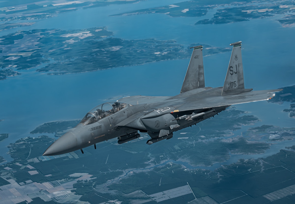 An F-15E Strike Eagle prepares to receive aerial refueling from a KC-135 Stratotanker operated by the Pennsylvania Air National Guard’s 171st Air Refueling Wing over Coraopolis, Pa., May 9, 2025. The mission was part of routine air-to-air refueling proficiency training, designed to maintain pilot readiness and ensure seamless interoperability between active duty and Air National Guard units. (U.S. Air National Guard photo by Master Sgt. George Perkins)