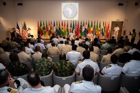 Distinguished visitors and exercise participants attend the closing ceremony of Obangame Express 2025. Obangame Express is one of three regional maritime exercises led by U.S. Sixth Fleet as part of a comprehensive strategy to provide collaborative opportunities to African forces and international partners to address maritime security concerns.