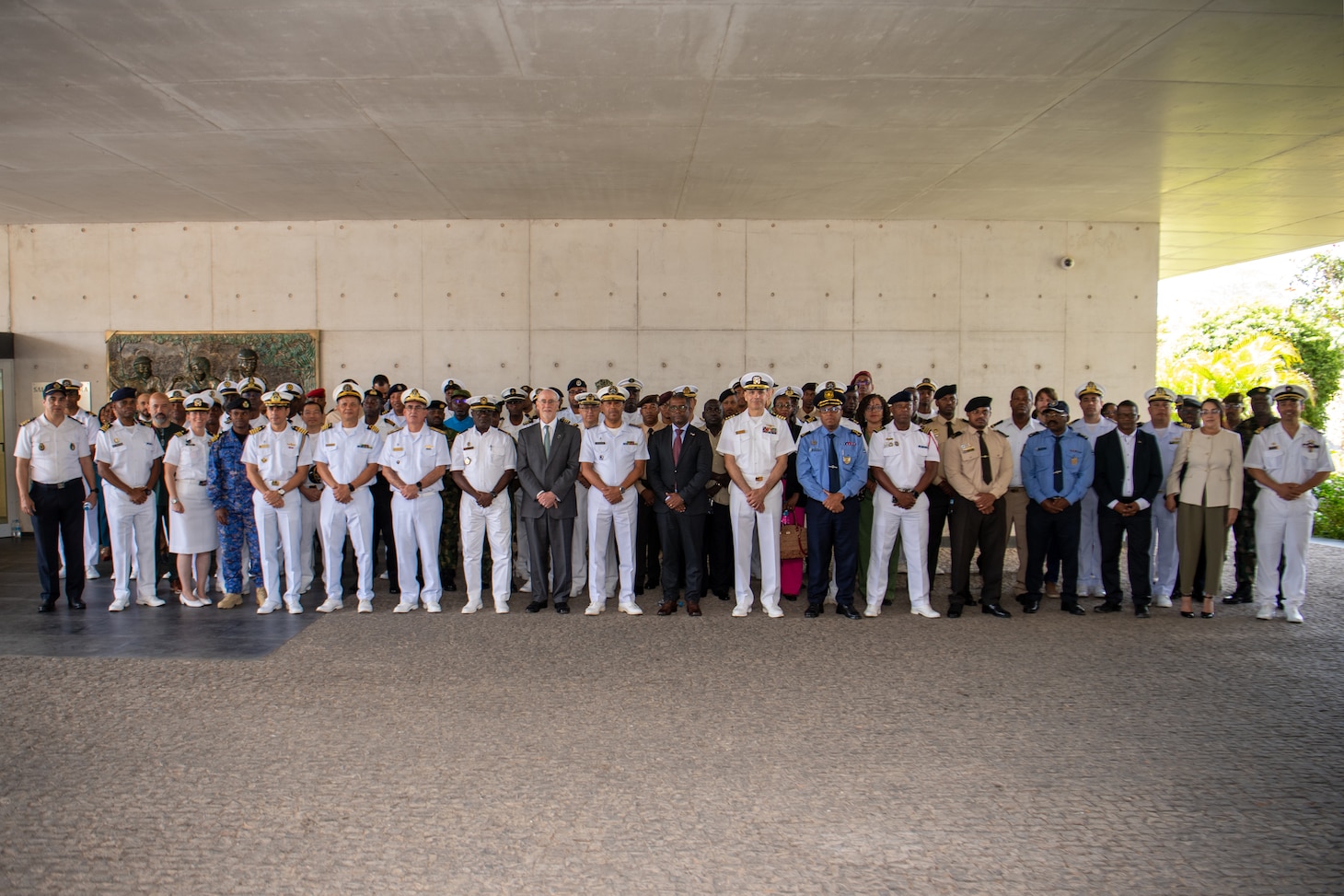 Distinguished visitors and exercise participants gather for a group photo at the closing ceremony of Obangame Express 2025. Obangame Express is one of three regional maritime exercises led by U.S. Sixth Fleet as part of a comprehensive strategy to provide collaborative opportunities to African forces and international partners to address maritime security concerns.