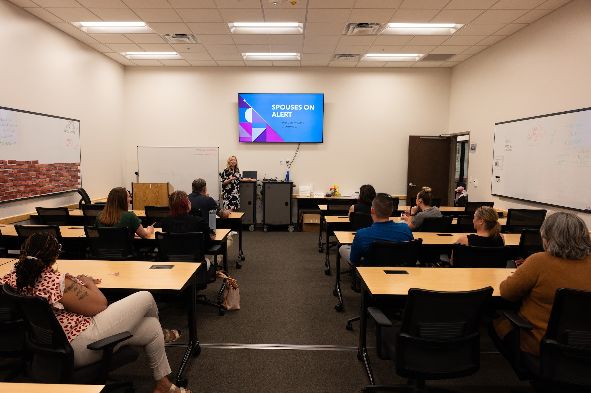 Chelsea Ecklebe, former True North program manager, hosts a Spouses on Alert brief at Whiteman Air Force Base, Missouri, May 15, 2025.