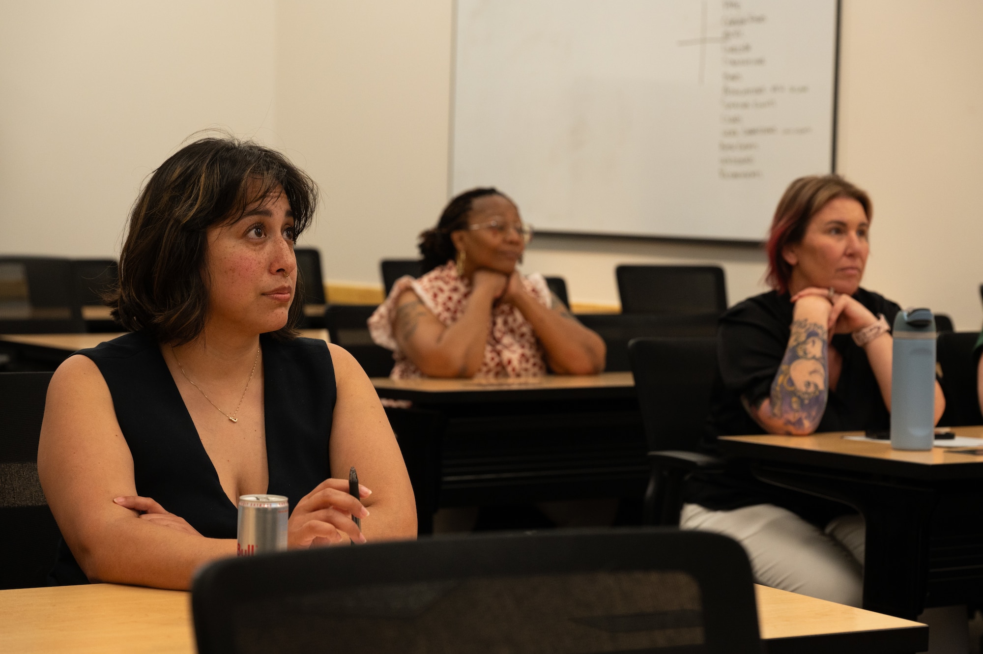 Military spouses listen to a Spouses on Alert brief at Whiteman Air Force Base, Missouri, May 15, 2025.