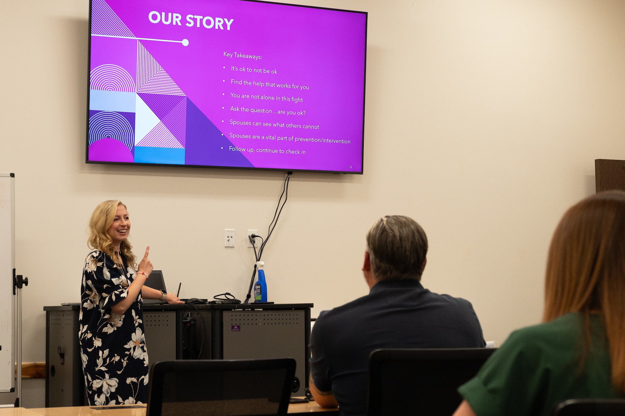 Chelsea Ecklebe, former True North program manager, presents a Spouses on Alert brief at Whiteman Air Force Base, Missouri, May 15, 2025.