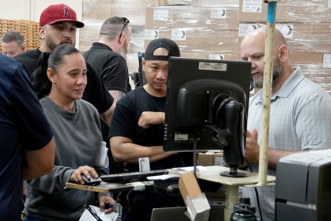 Workers in warehouse.