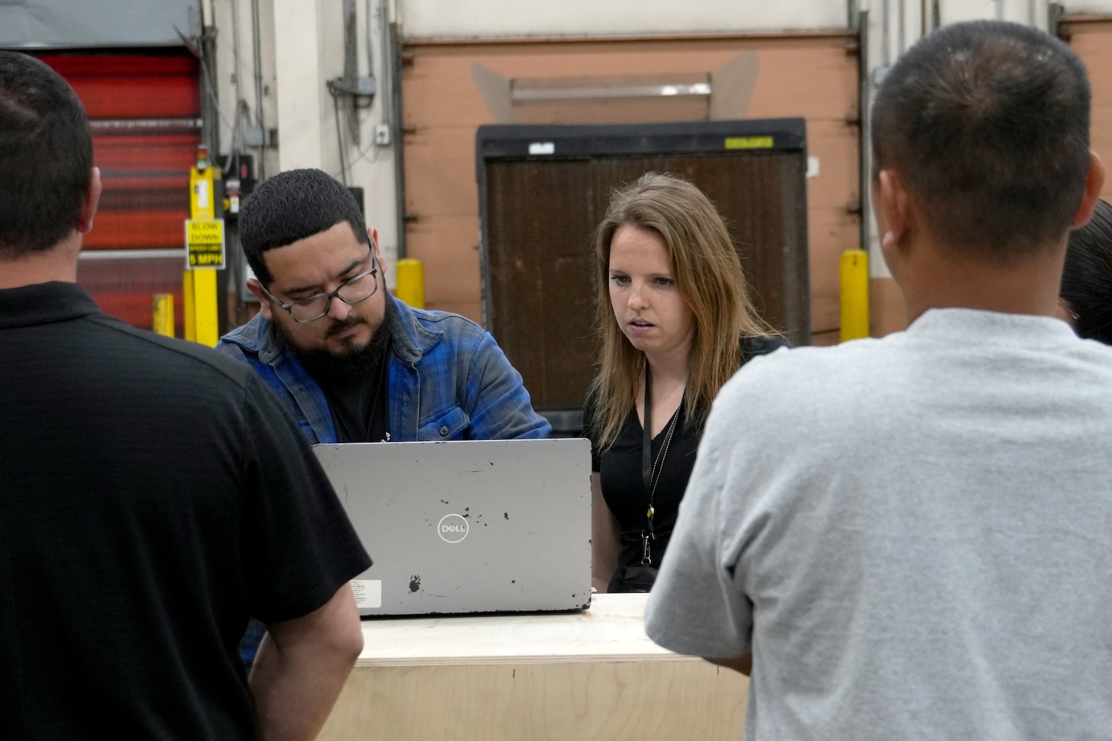Workers in warehouse.