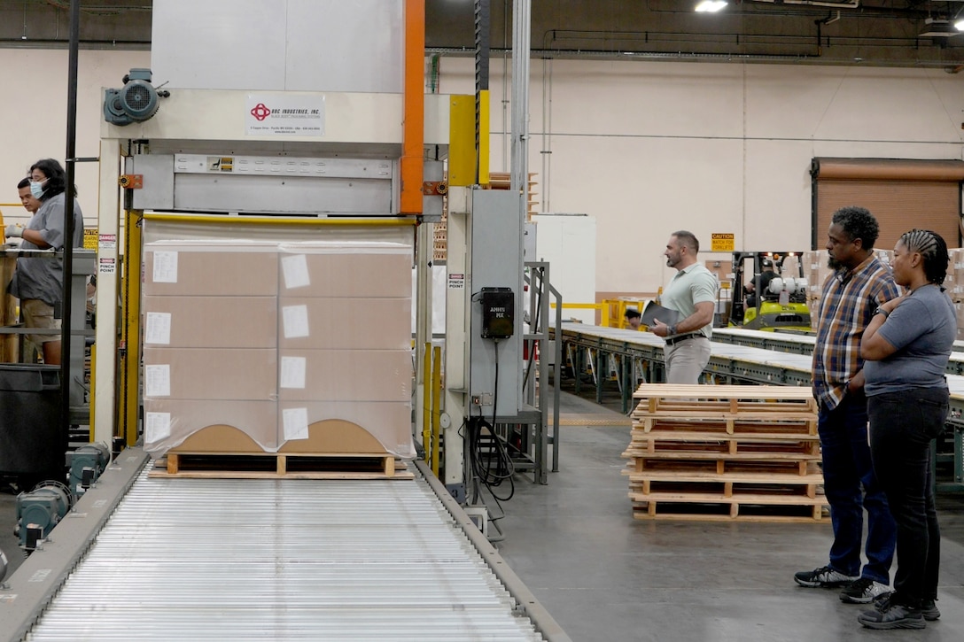 Workers in warehouse.