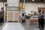 Workers in warehouse.