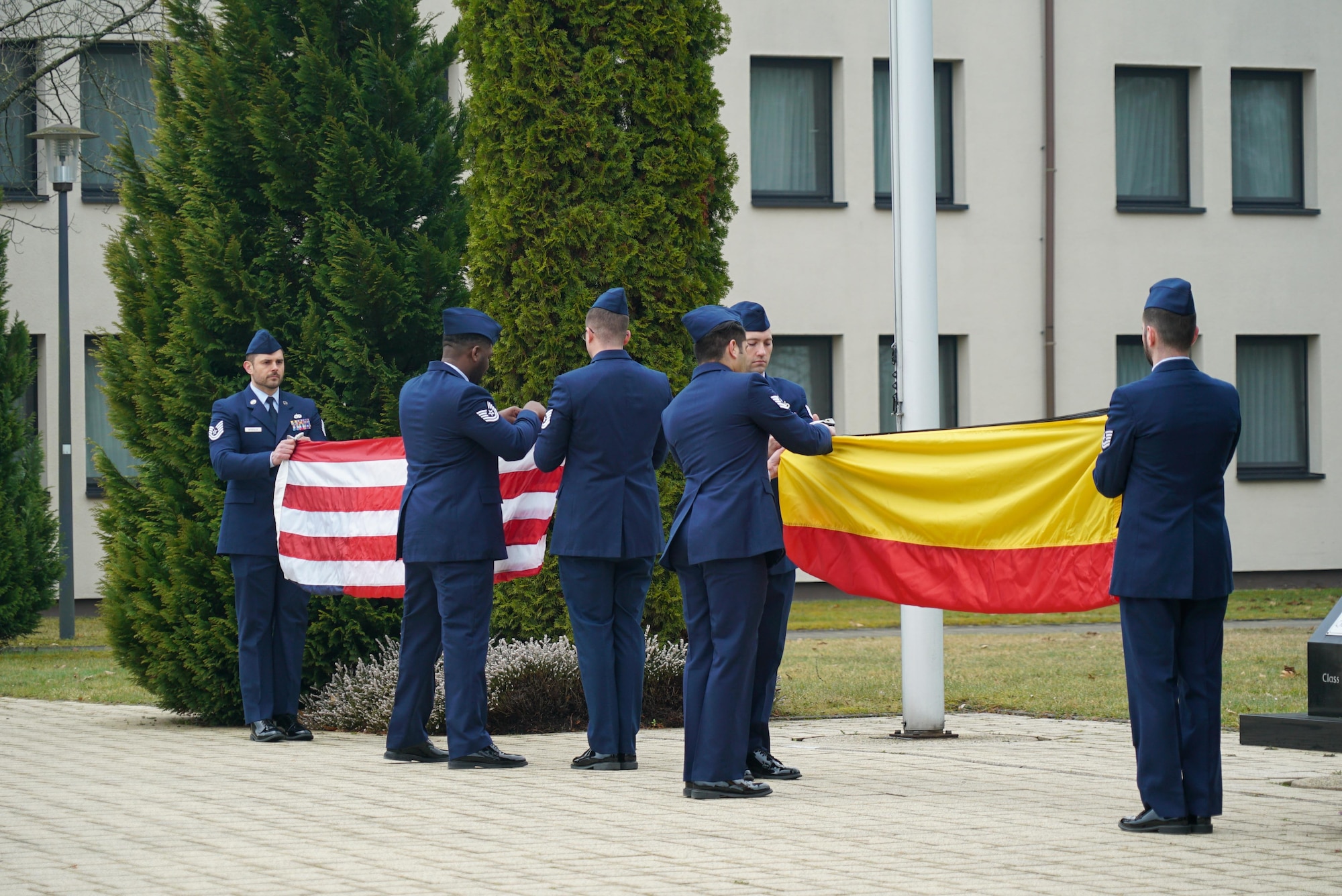 Students retire the colors during a retreat ceremony