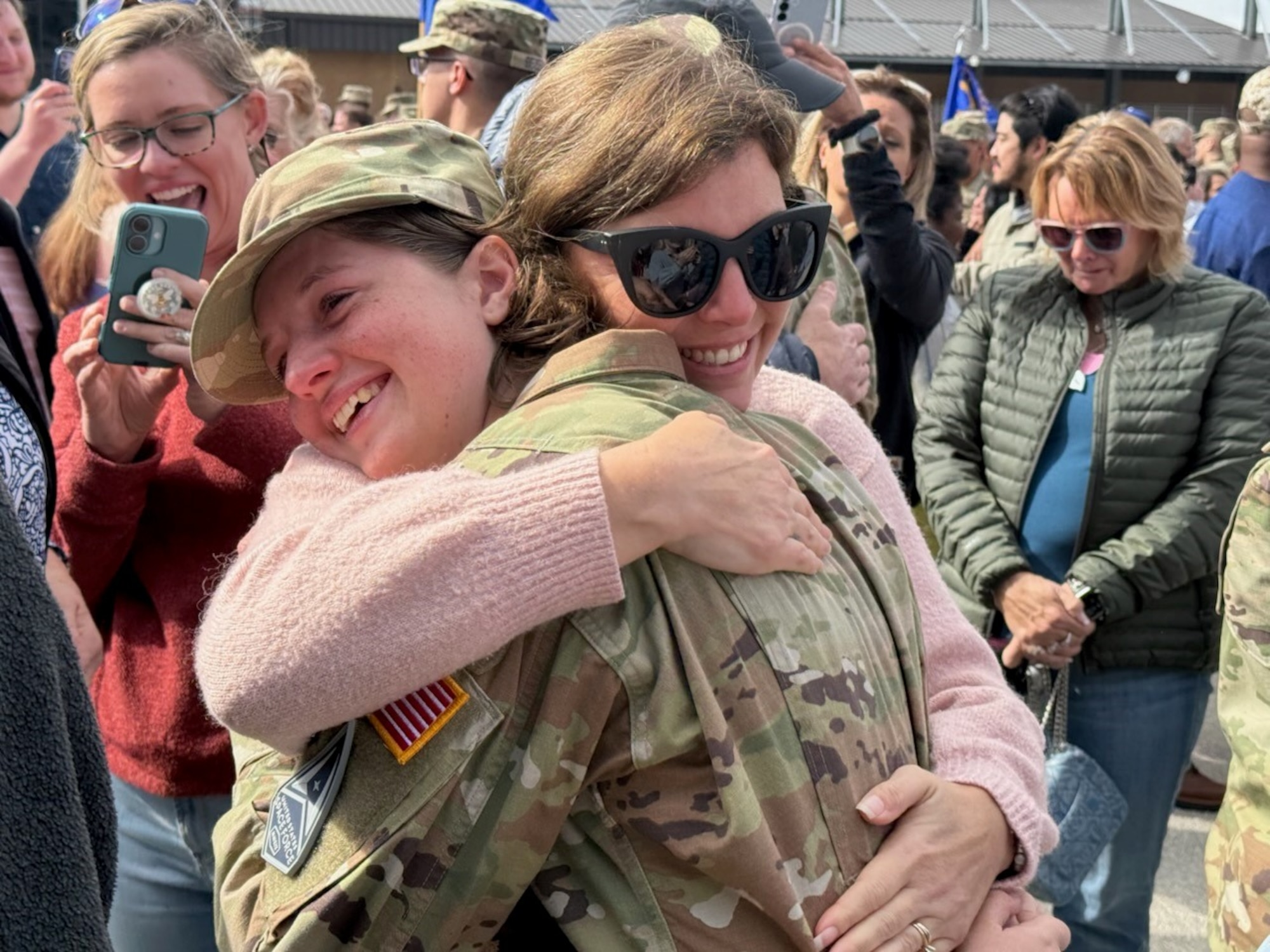 Space Force Specialist hugs mother at coining