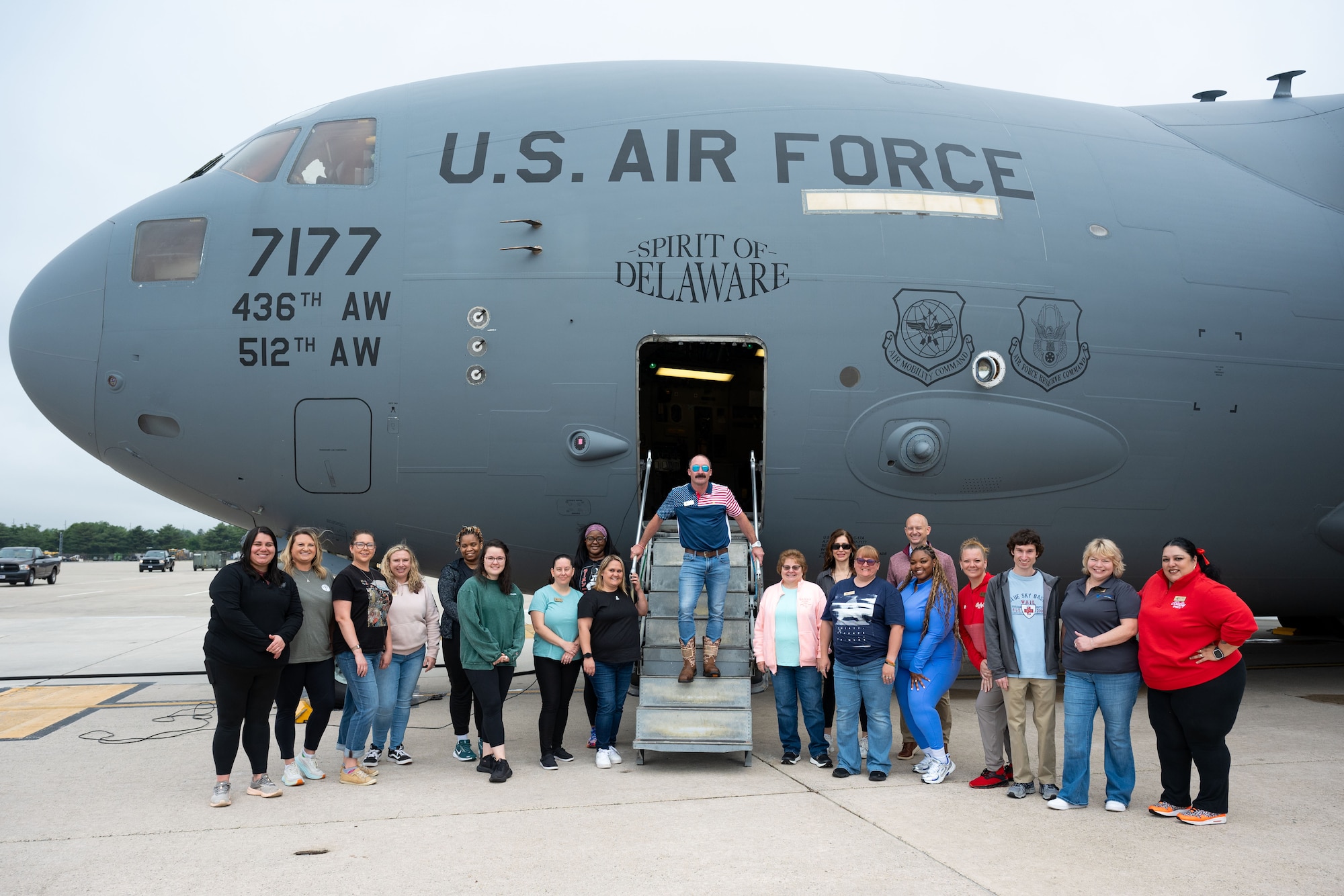 Leadership Central Delaware members pose for a photo in front of a C-17 Globemaster III at Dover Air Force Base, Delaware, May 15, 2025. LCD members received an orientation flight on a C-17 Globemaster III where members witnessed air refueling and a combat offload. (U.S. Air Force photo by Senior Airman Trenten Walters)