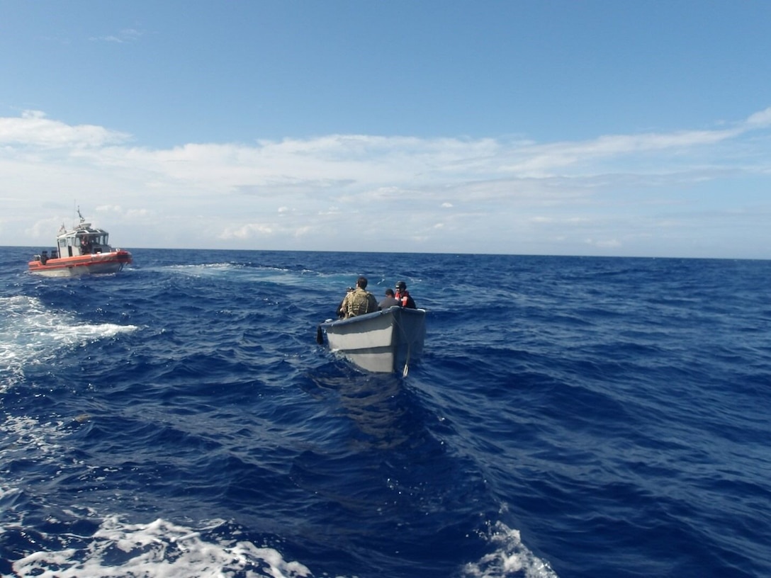 A law enforcement boat crew assigned to U.S. Coast Guard Cutter Calhoun (WMSL 759) conducts a boarding of a vessel suspected of smuggling narcotics approximately 70 miles off the coast of the Dominican Republic, May 5, 2025. USCGC Calhoun’s crew offloaded approximately 19,055 pounds of cocaine and marijuana, worth an estimated $140.9 million, at Port Everglades, May 16, 2025. (U.S. Coast Guard photo)
