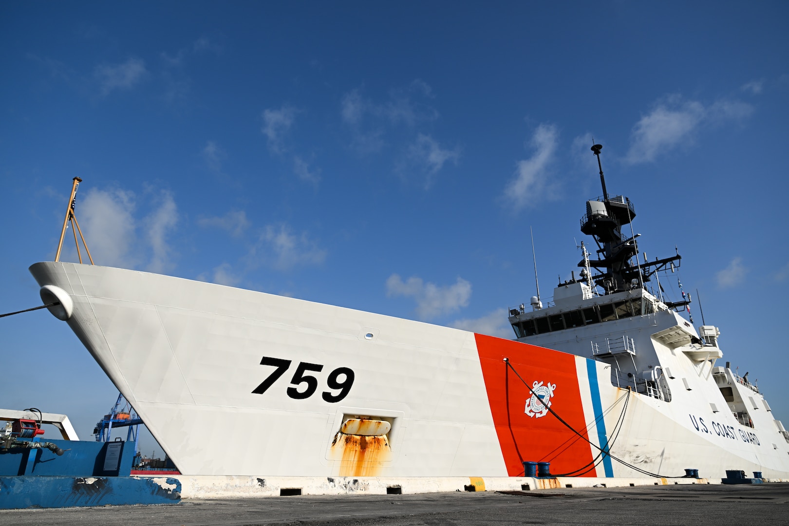 The crew of U.S. Coast Guard Cutter Calhoun (WMSL 759) moors at Port Everglades for a drug offload, May 16, 2025. Calhoun’s crew offloaded more than 19,055 pounds of cocaine and marijuana valued at approximately $140.9 million in Port Everglades, May 16, 2025. (Coast Guard photo by Petty Officer 3rd Class Jessica Walker)