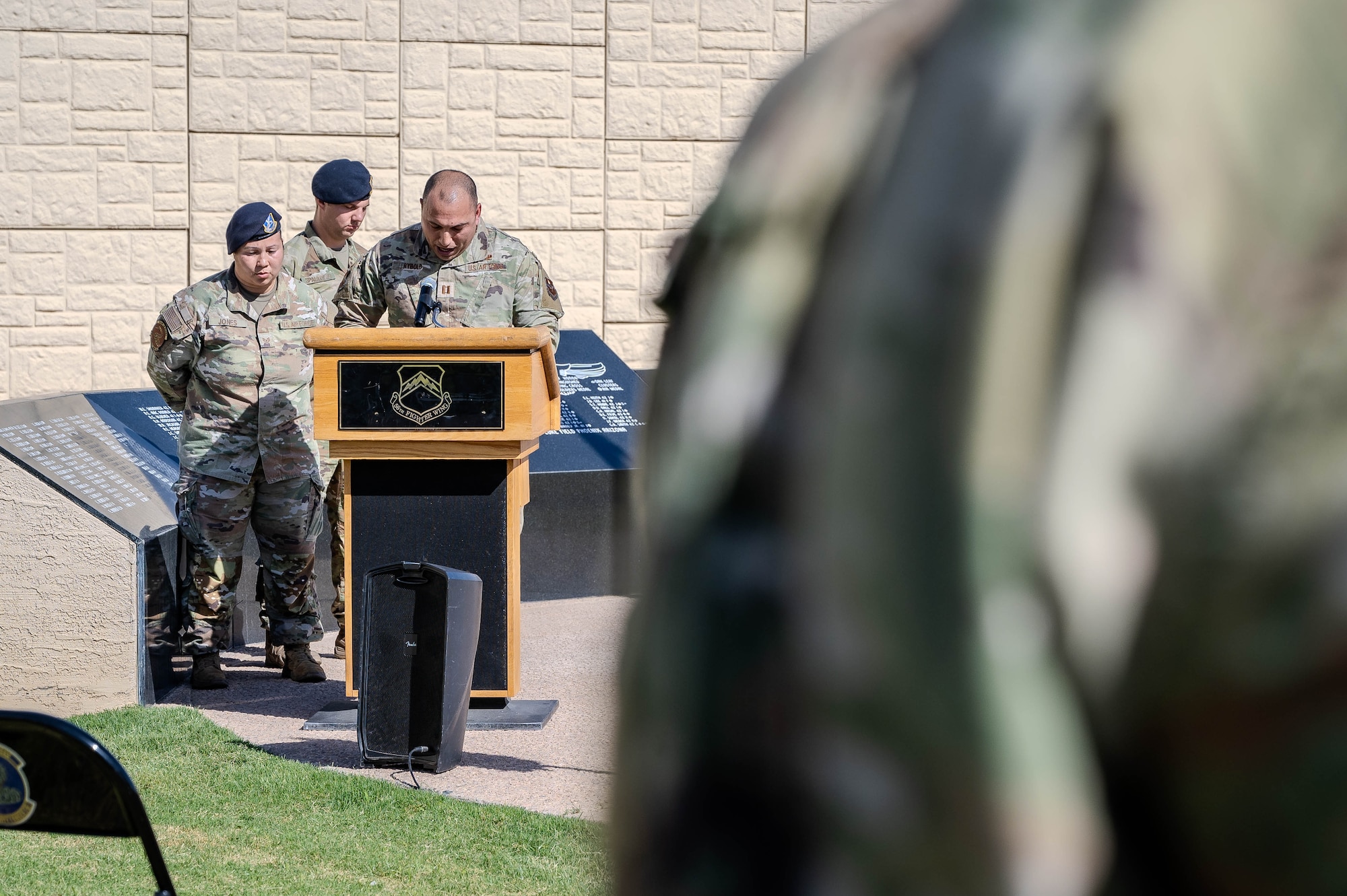 U.S. Air Force Capt. Jeffrey Rybold, 56th Fighter Wing chaplain, delivers a prayer during the invocation of a POW/MIA retreat ceremony