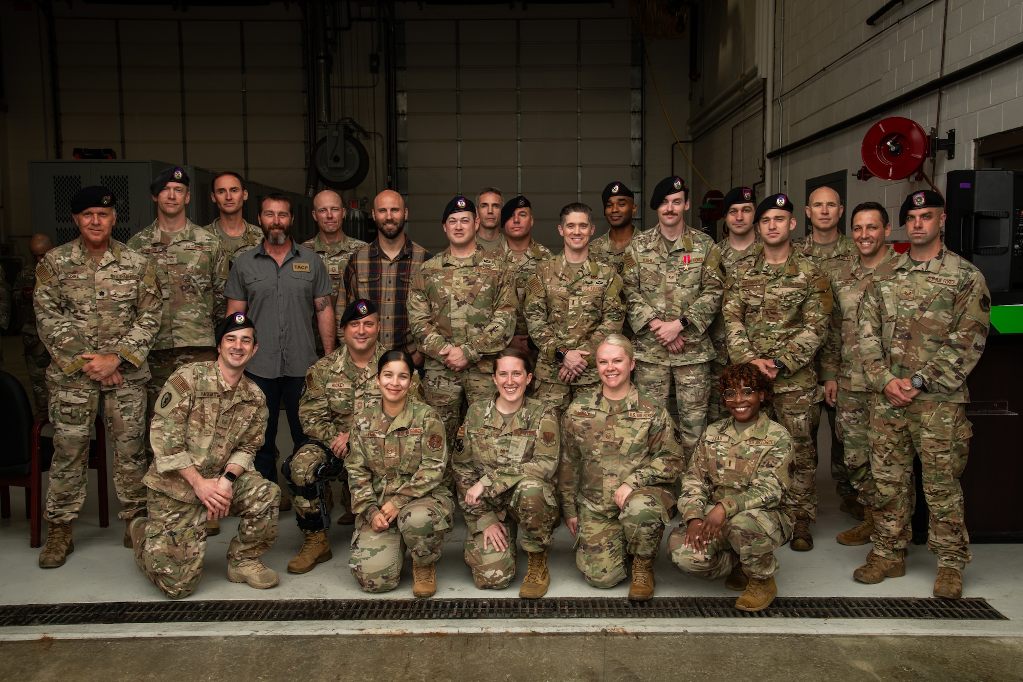 Photo of Members of the 227th Air Support Operations Squadron pose for a photo after a Casing of the Colors Ceremony at the 177th Fighter Wing, Egg Harbor Township, New Jersey, May 4, 2025. The Casing of the Colors Ceremony marks a transition of a unit, whether that be inactivation, relocation, or deployment.