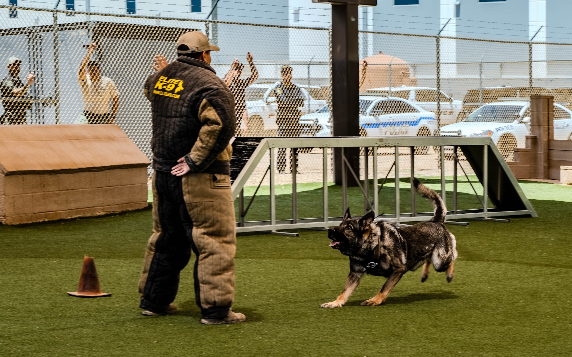 Blitz, a K-9 assigned to the Casa Grande Police Department, runs toward a decoy during a police and military K-9 competition