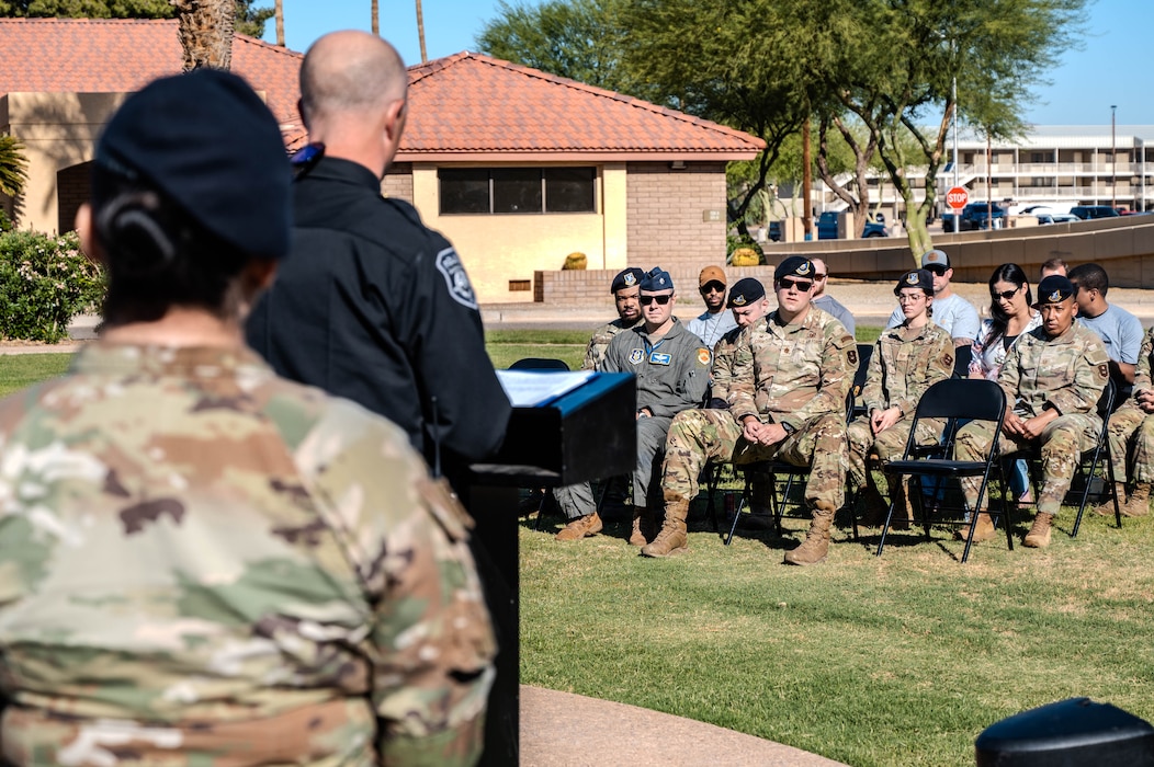 U.S. Air Force Airmen assigned to the 56th Fighter Wing gather at Luke Air Force Base’s closing ceremony for National Police Week