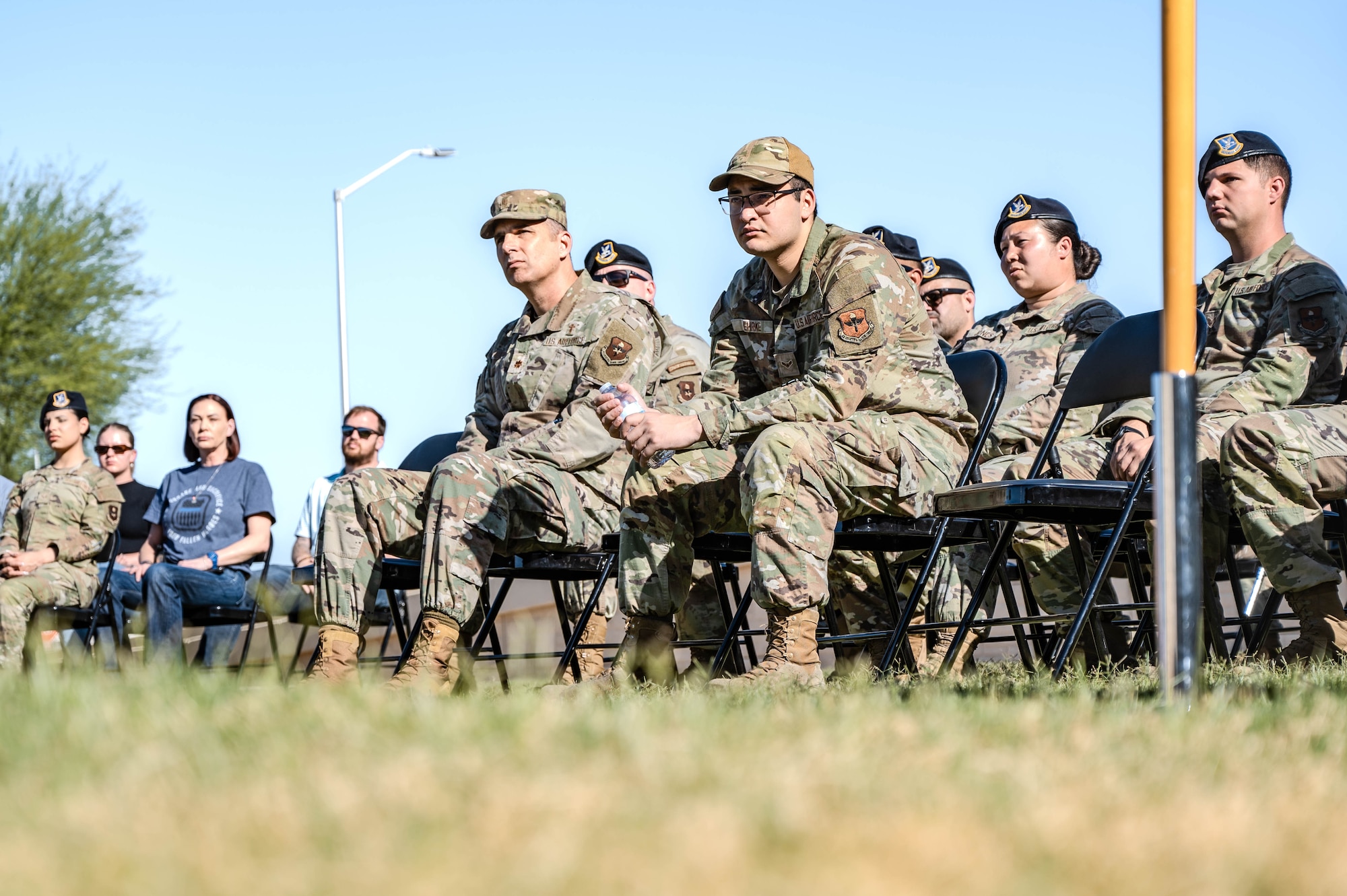 U.S. Air Force Airmen assigned to the 56th Fighter Wing gather at Luke Air Force Base’s closing ceremony for National Police Week