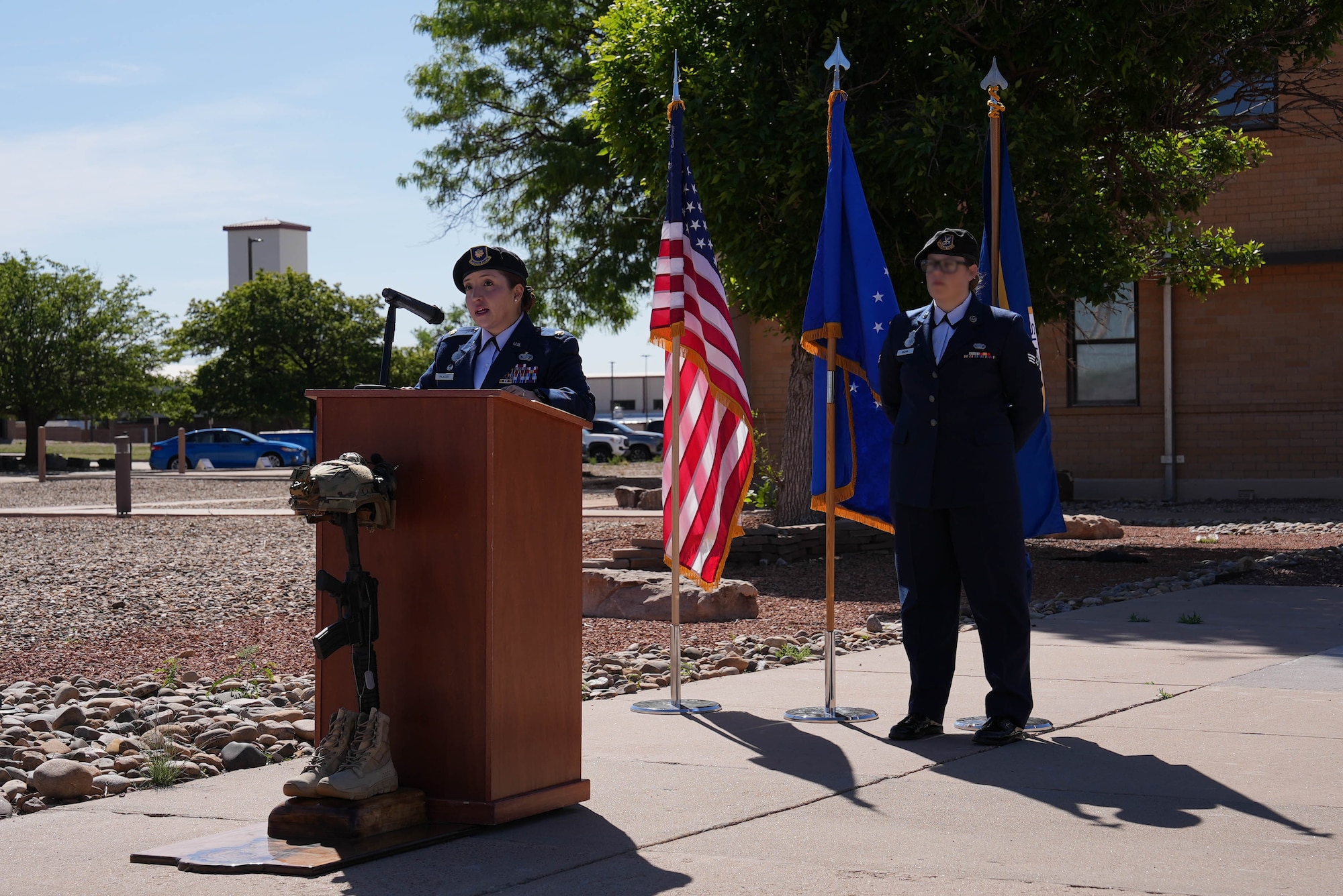 U.S. Air Force Maj. Brigitte Palacious, a squadron commander assigned to the 27th Special Operations Wing, delivers the closing remarks at the closing ceremony of National Police Week at Cannon Air Force Base, New Mexico, May 16, 2025. National Police Week is dedicated to the honor, remembrance, and support of American law enforcement officers, including Security Forces Airmen. (U.S. Air Force photo by Staff Sgt. Kevin Williams)
