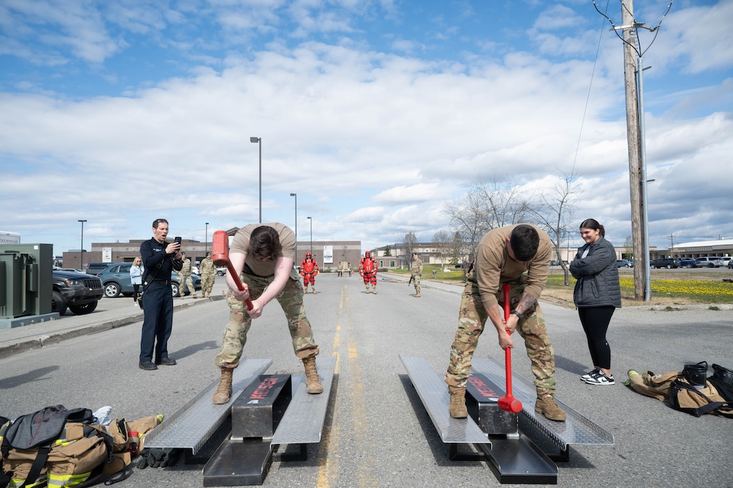 U.S. Air Force Airmen from the 354th Security Forces Squadron and 354th Civil Engineering Squadron compete on keiser force machines during the Battle of the Badges at Eielson Air Force Base, Alaska, May 13, 2025.