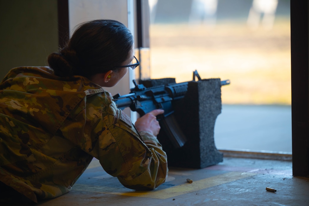 U.S. Air Force Tech. Sgt. Ashley Osip, 354th Maintenance Squadron security manager, aims at a target during a Combat Arms Training and Maintenance excellence in shooting competition at Eielson Air Force Base, Alaska, May 15, 2025.