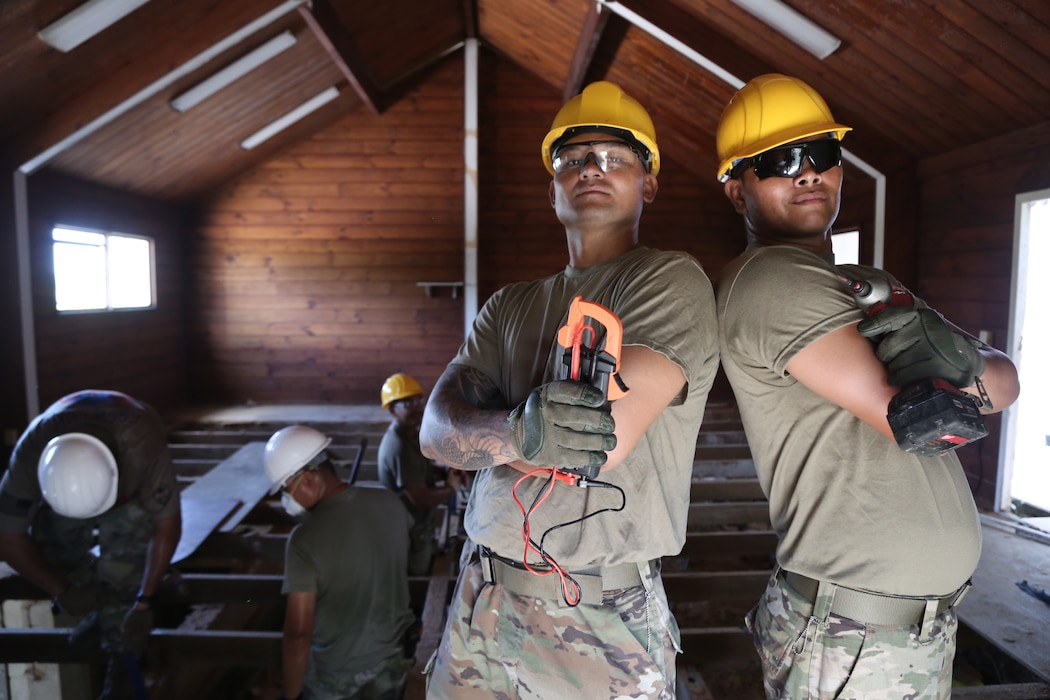 U.S. Army Privates First Class Jay Rideb, left, and Willie Aguilar, assigned to the 1224th Engineer Support Company, Guam National Guard, renovate a prenatal and neonatal resource center during Annual Training, Guam, May 9, 2025.