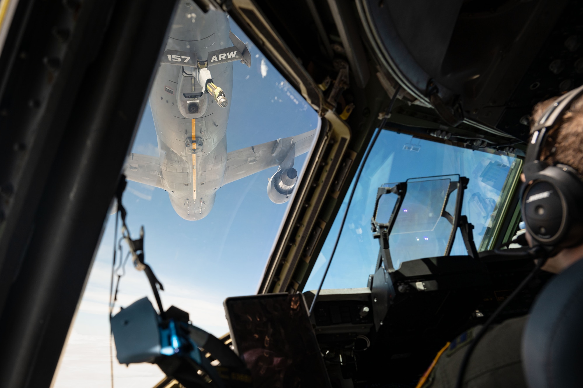 U.S. Air Force Capt. Dustin Weisner, 3rd Airlift Squadron pilot, aligns a C-17 Globemaster III to receive fuel during a Leadership Central Delaware orientation flight near the U.S. East Coast, May 15, 2025. The LCD program, operated by the Central Delaware Chamber of Commerce, visits Dover AFB annually to gain better understanding of base operations and to build community ties with the Air Force. (U.S. Air Force Senior Airman Trenten Walters)