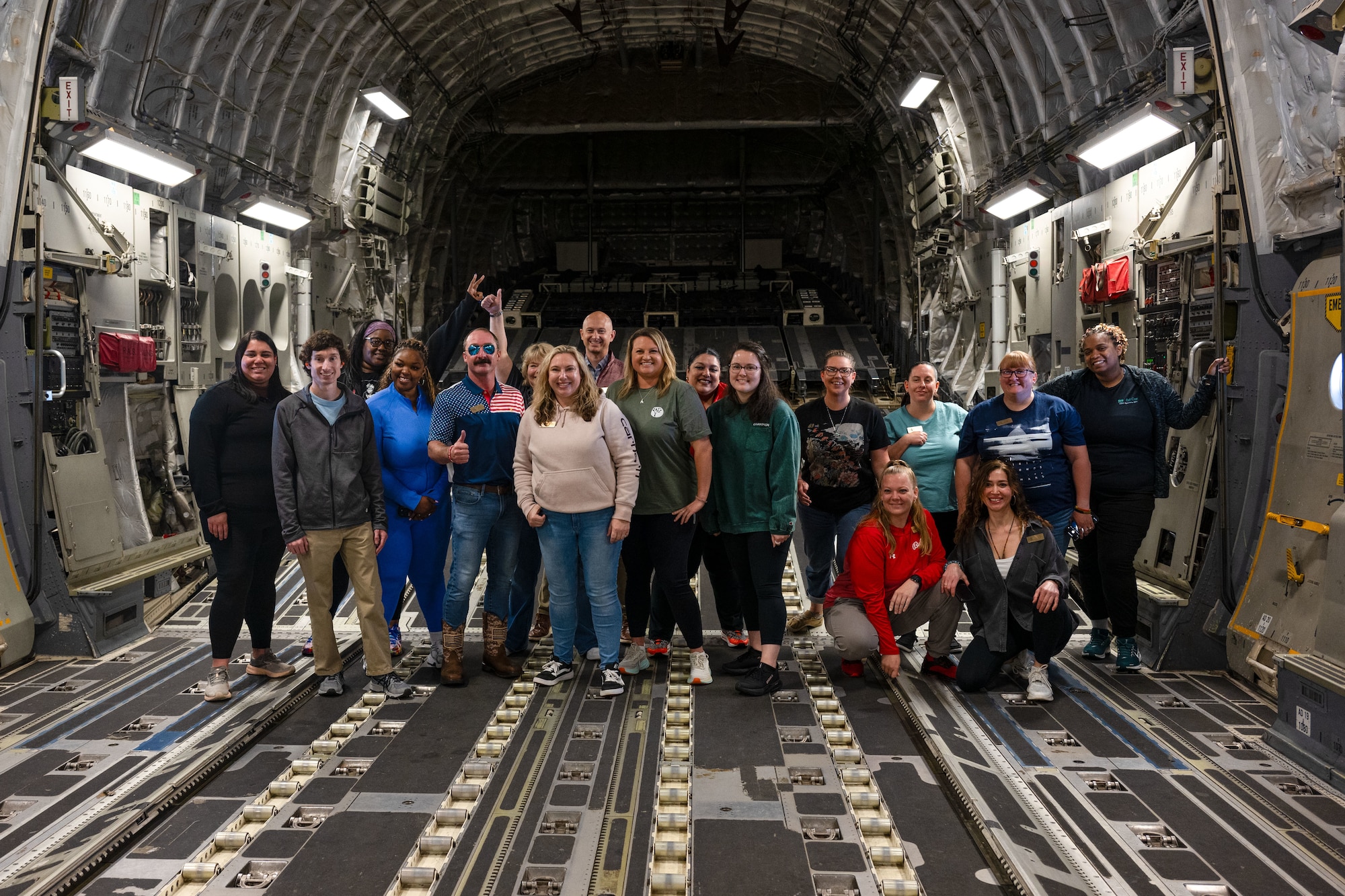 Leadership Central Delaware members pose for a photo inside of a C-17 Globemaster III at Dover Air Force Base, Delaware, May 15, 2025. LCD members received an orientation flight on a C-17 Globemaster III where members witnessed air refueling and a combat offload. (U.S. Air Force photo by Senior Airman Trenten Walters)