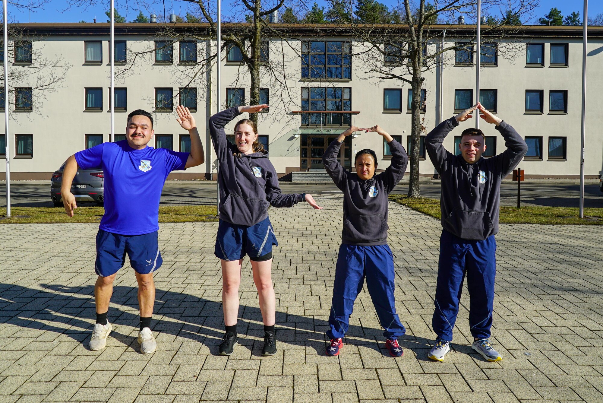 Instructors spell “NCOA” with their arms
