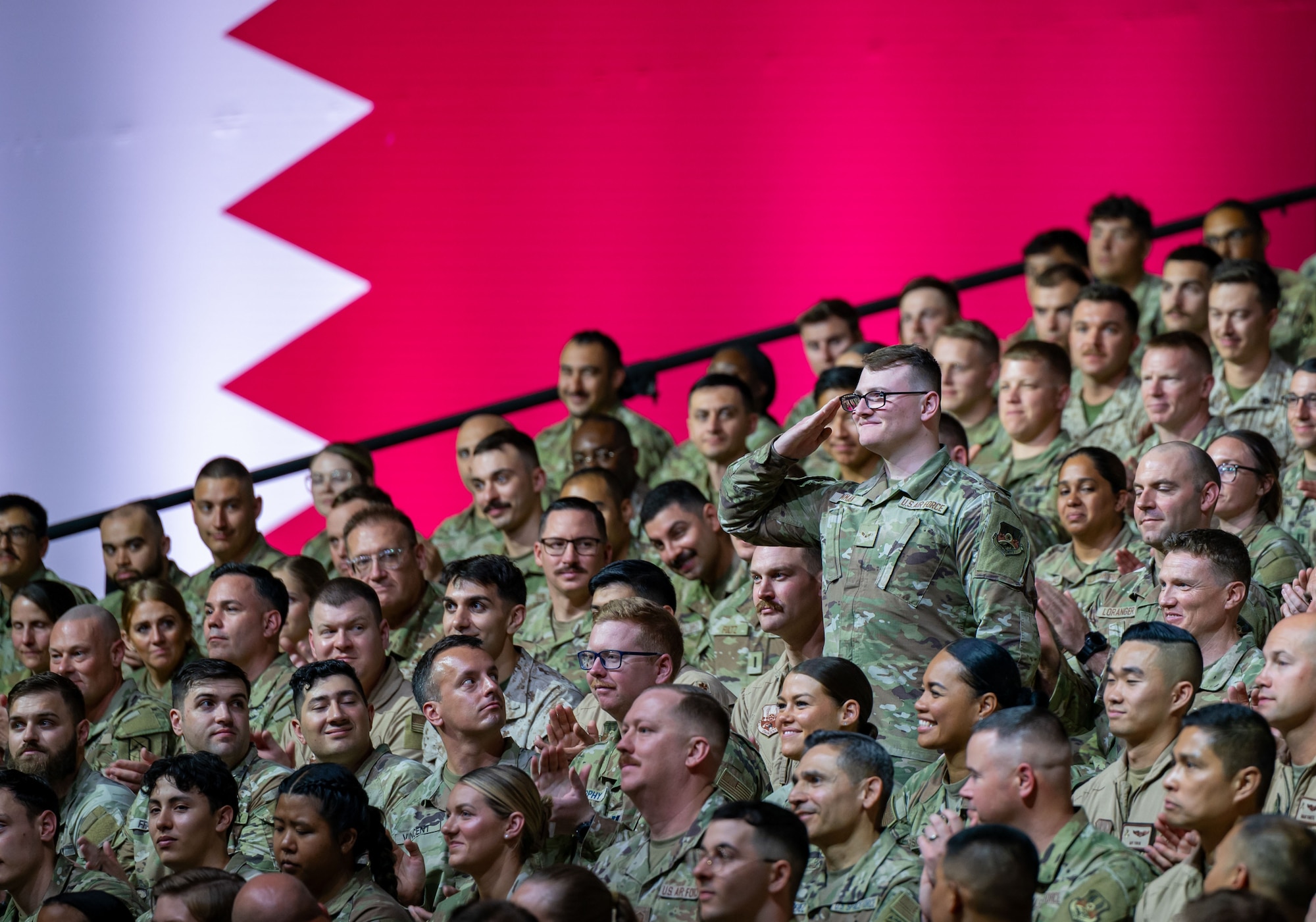 U.S. Airman 1st Class Ashton Inman, 386th Expeditionary Operational Support Squadron airfield management specialist, salutes President Donald J. Trump during a visit to Al Udeid Air Base, Qatar, May 15, 2025. Trump recognized several service members for their outstanding service while deployed to the area of responsibility. (U.S. Air Force photo by Senior Airman Amanda Jett)