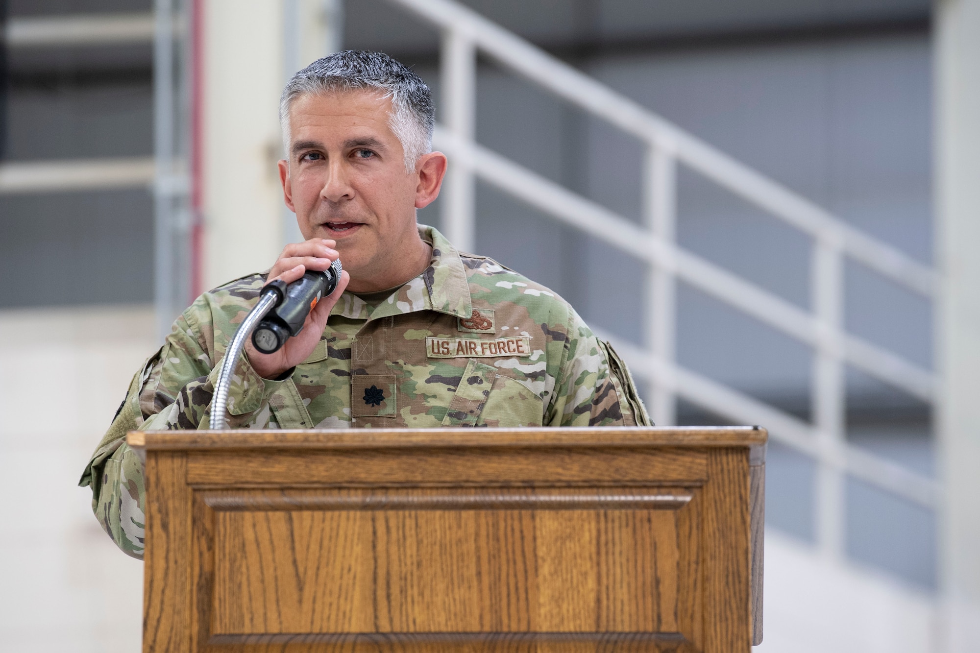 Lt. Col. John Valdes III, 434th Maintenance Group commander, speaks to the audience