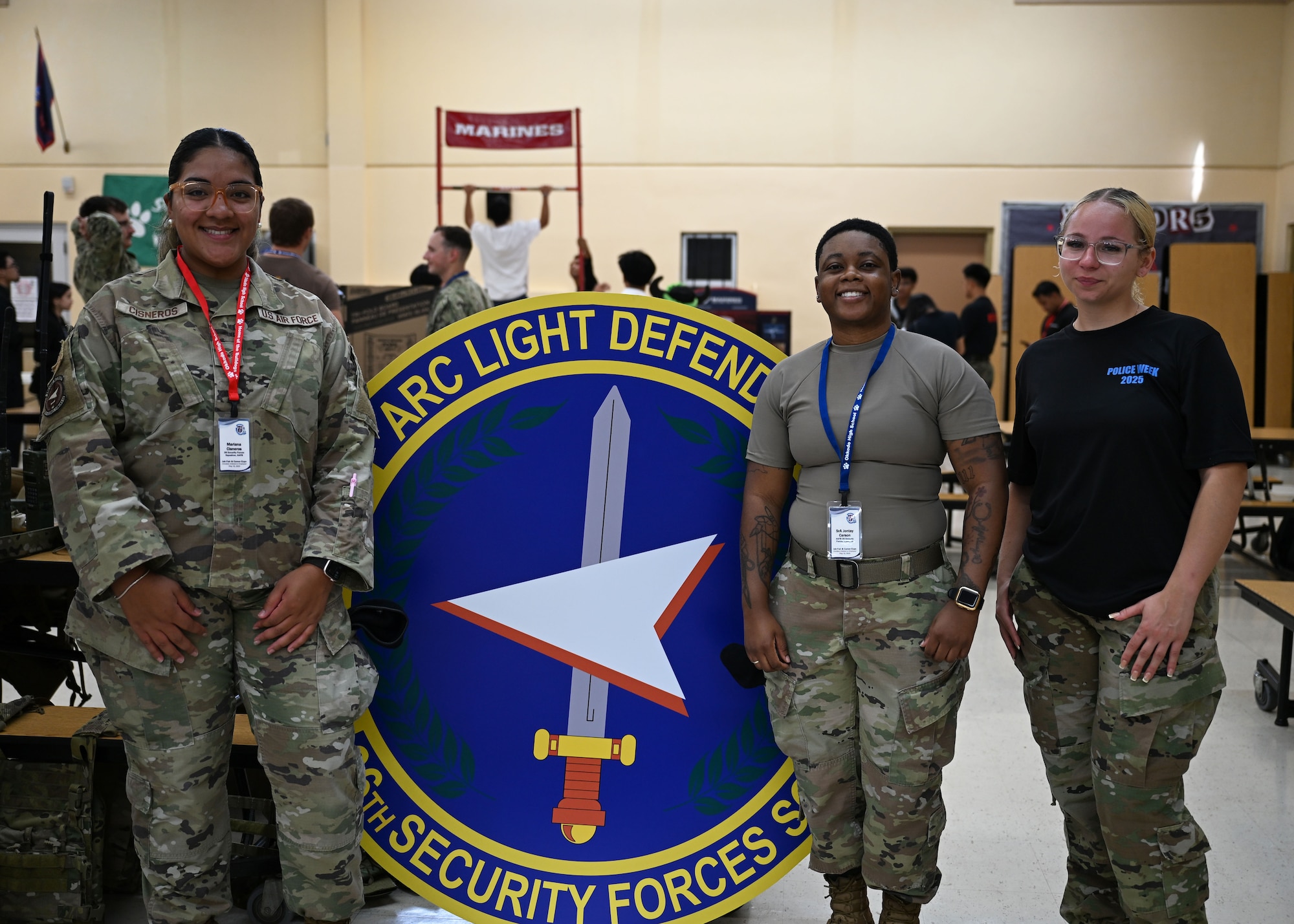 Airmen volunteer during Career Day at Okkodo High School, Guam, May 16, 2025. The Airmen discussed career pipelines and day to day life on the job. (U.S. Air Force photo by Senior Airman Audree Campbell)