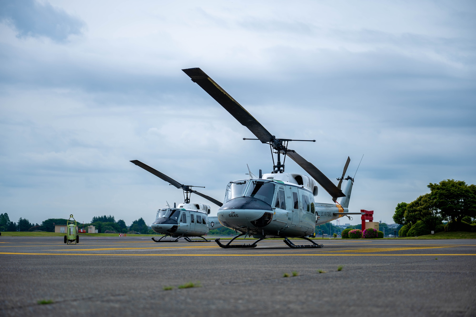 two helicopters on the ground