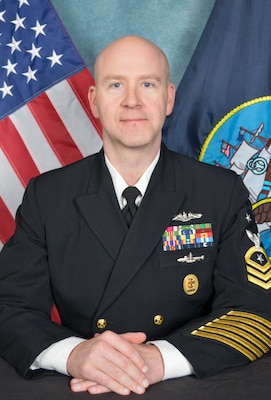 The official bio photo for CMC Christopher Brey