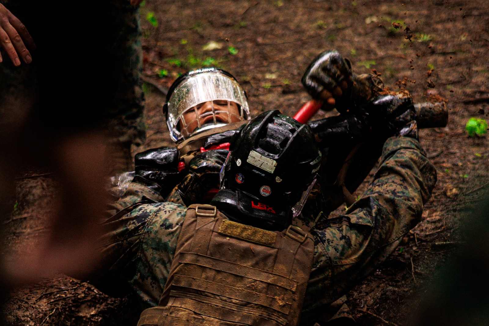 Students with the Martial Arts Instructor Trainer Course 2-25, spar during the “Fighting Holes” training event at The Basic School on Marine Corps Base Quantico, May 13, 2025. Squads engaged head-to-head inside of fighting holes simulating close quarter combat while implementing techniques learned within the Marine Corps Martial Arts Program. (U.S. Marine Corps photo by Lance Cpl. Braydon Rogers)